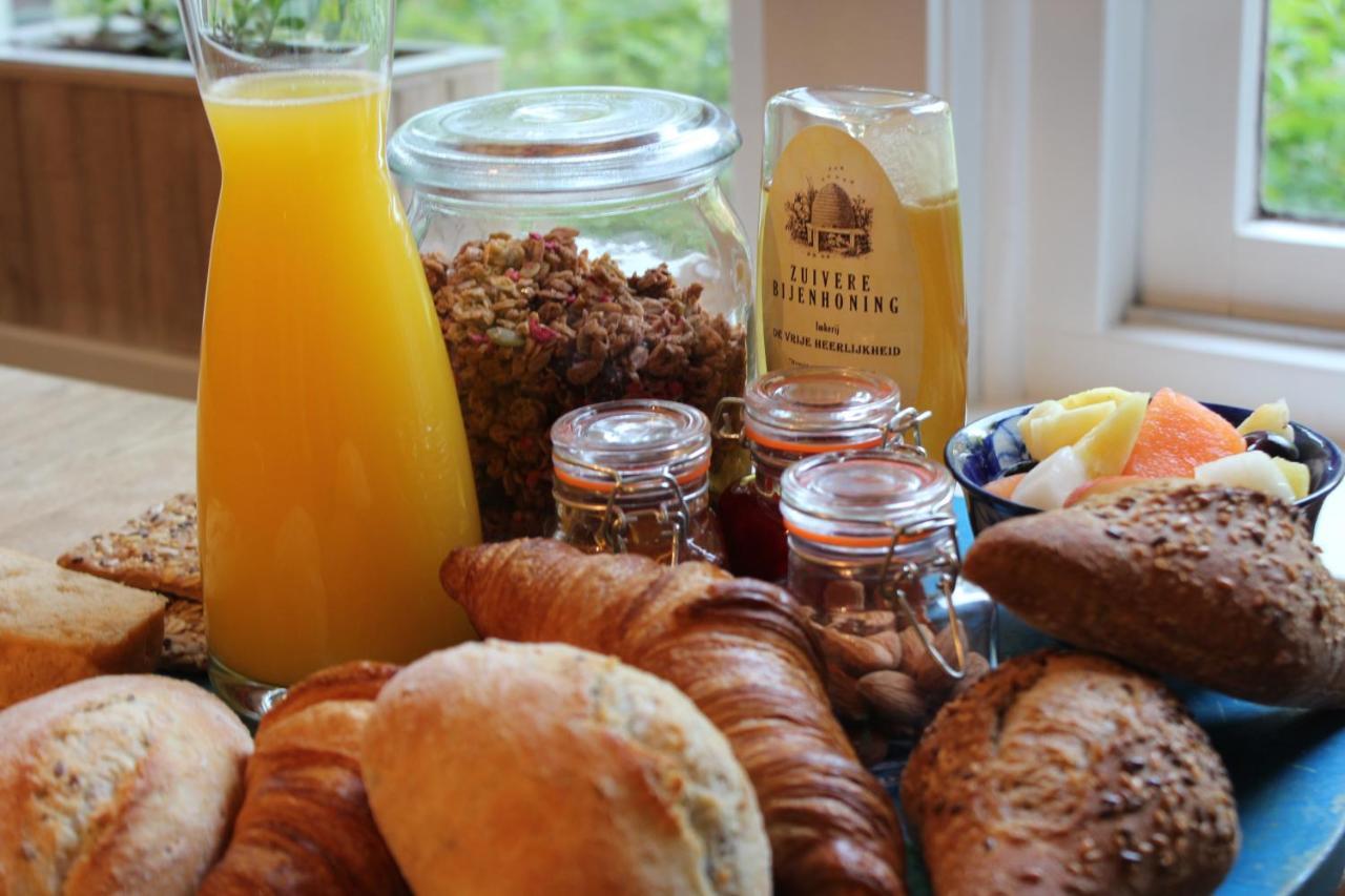 Het Aambeeld Bed & Breakfast Wanroij Bagian luar foto